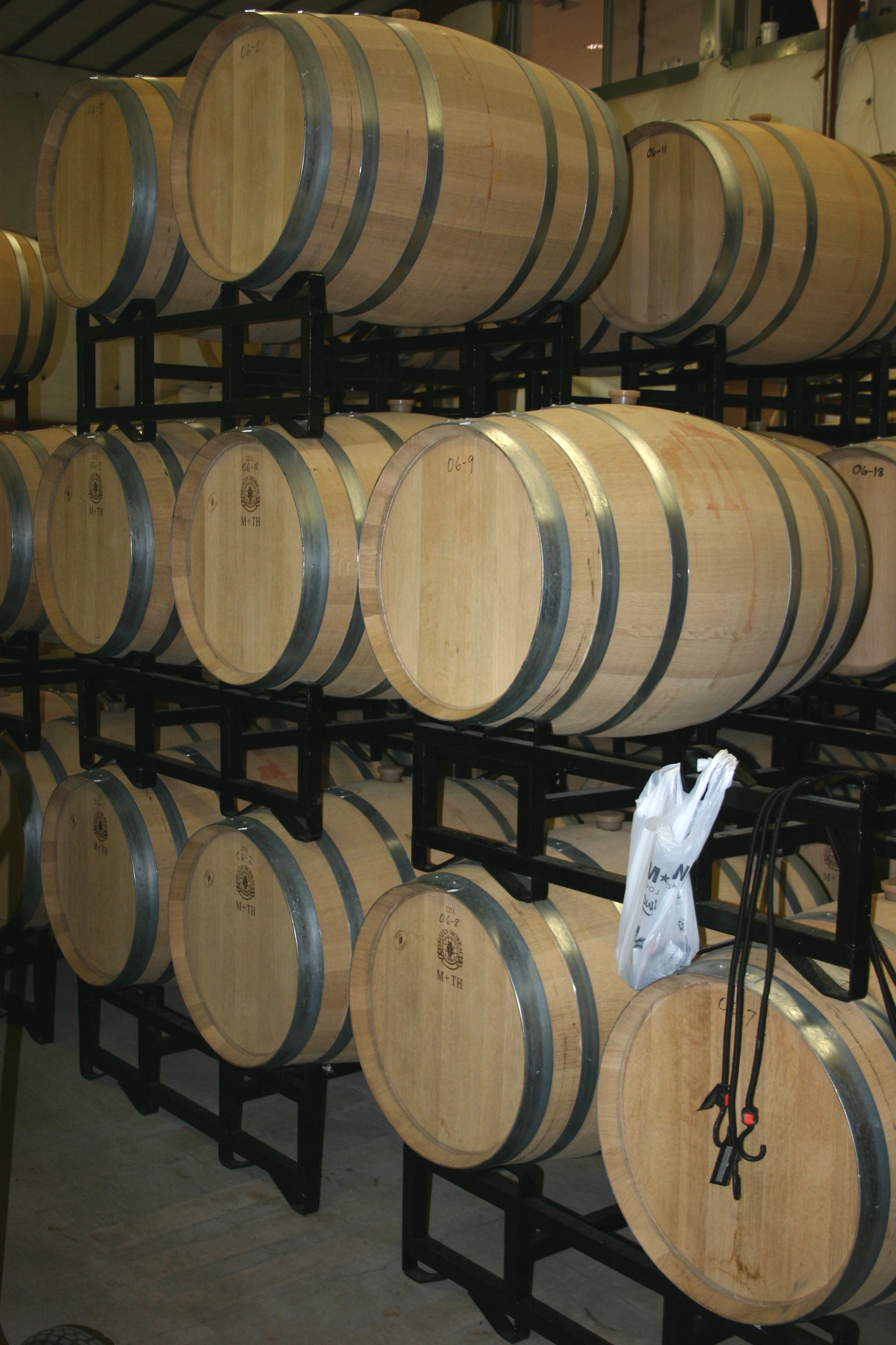 Barrels of aging wine